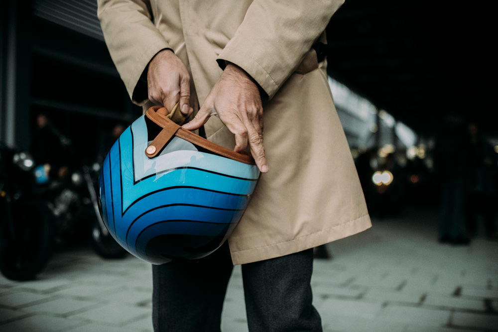 a man holding hedon helmet, london gentlemans ride 2016